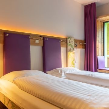 Modernes Design-Zimmer für Deinen Urlaub in den Bergen